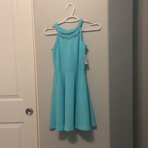 Brand new turquoise kids dress.